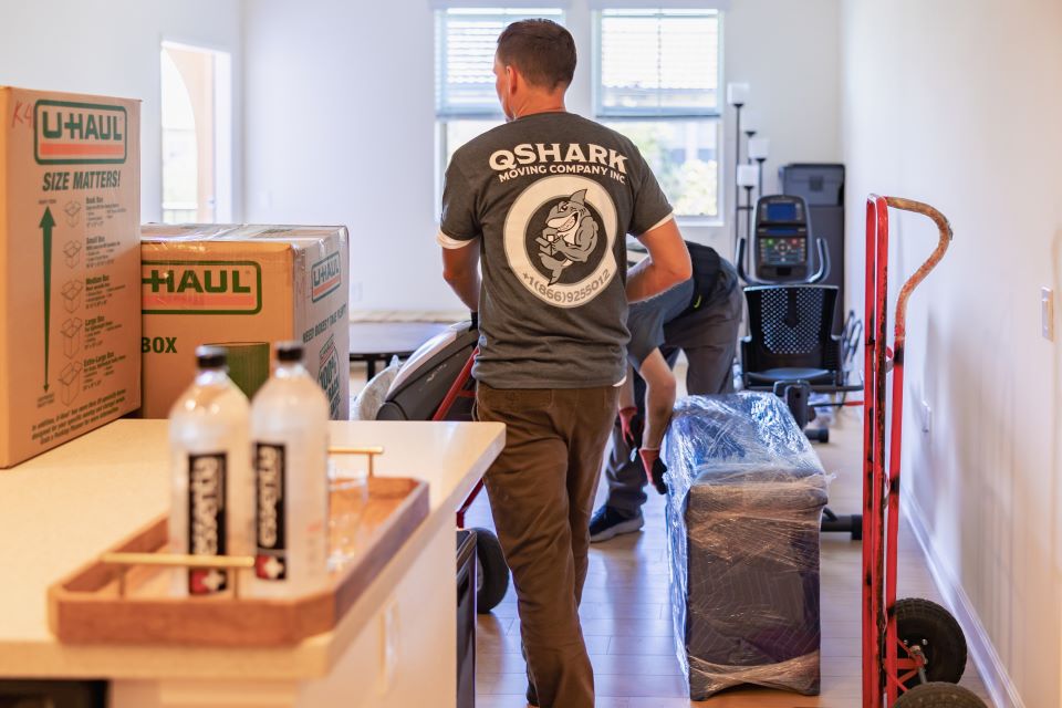 a picture Qshark luxury movers at work