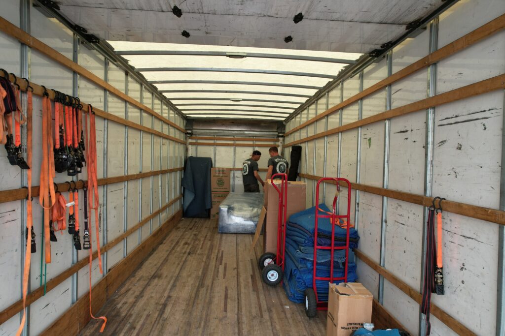 How To Pack Jewelry For Moving. a picture of qshark movers organazing a truck