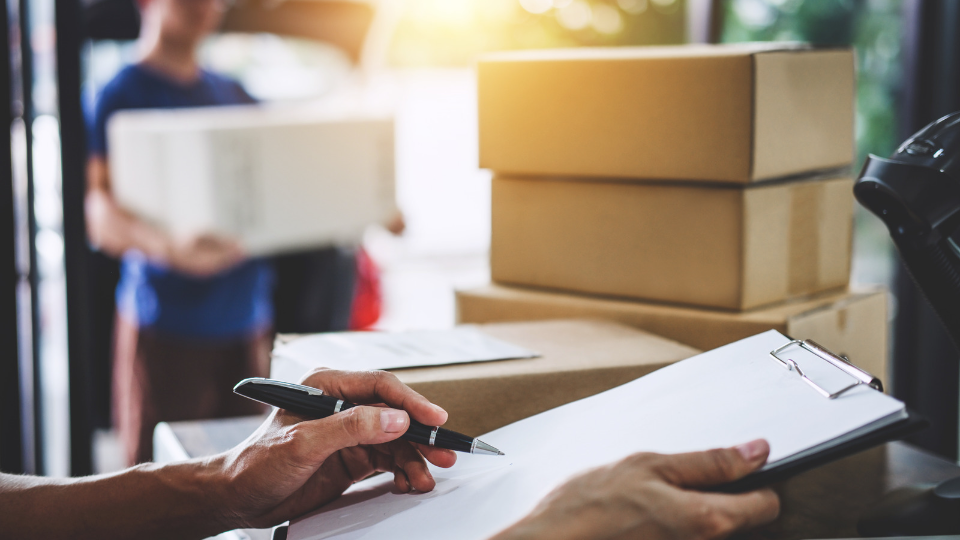how to change your mailing address when moving? a picture showing a person with a check list