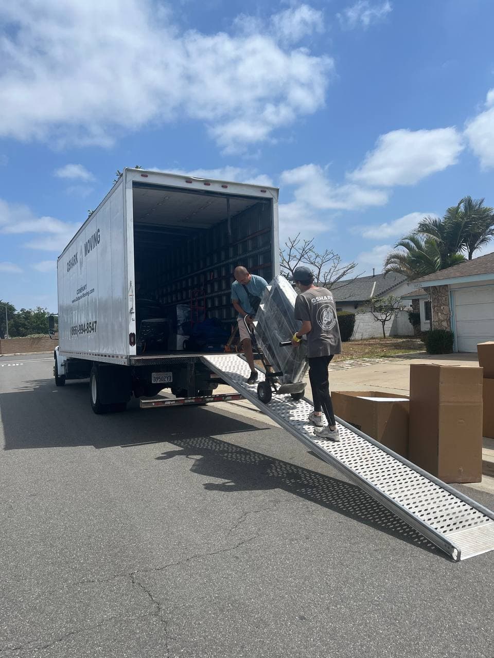 Heavy item loading by Qshark movers in Los Angeles